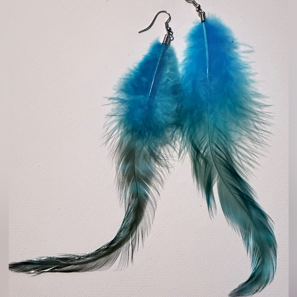 Airy blue feather earrings